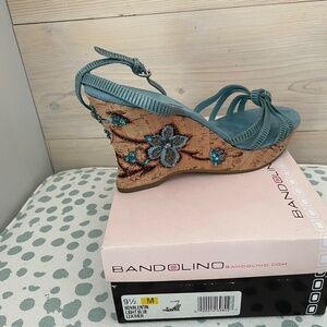 Jeweled mandolin wedge sandal.